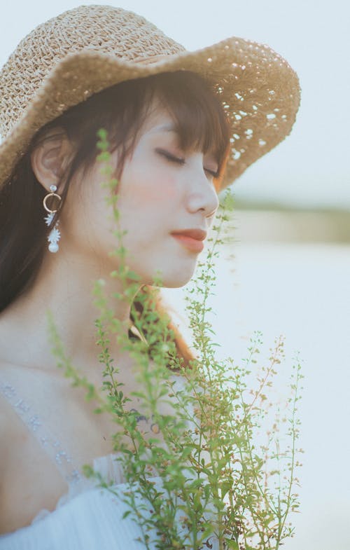 Woman Wearing a Brown Sun Hat 