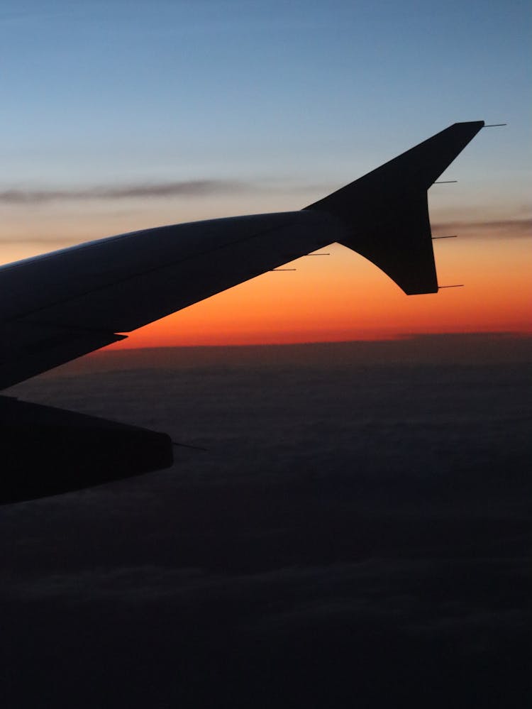 Silhouette Of An Airplane's Empennage