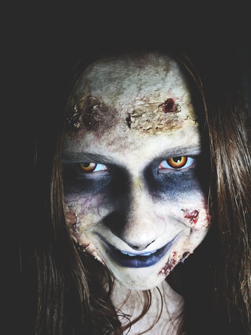 Close-up Photo of Woman with Scary Make-up 