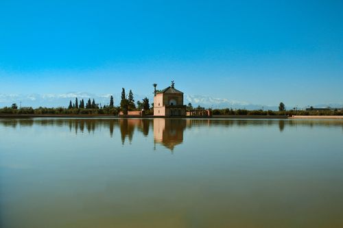 Menara Gardens pavilion with water reflection, Marrakech