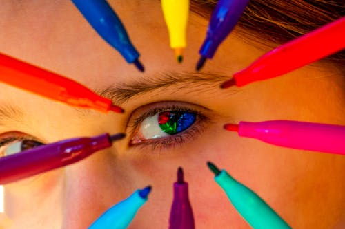 Gratis stockfoto met blauwe ogen, felle kleuren, groene ogen