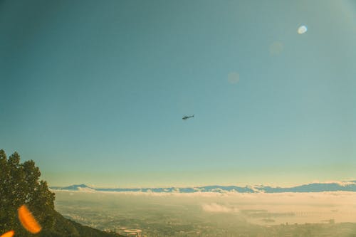 Gratis stockfoto met blauwe lucht, helikopter, Lensflare Stockfoto