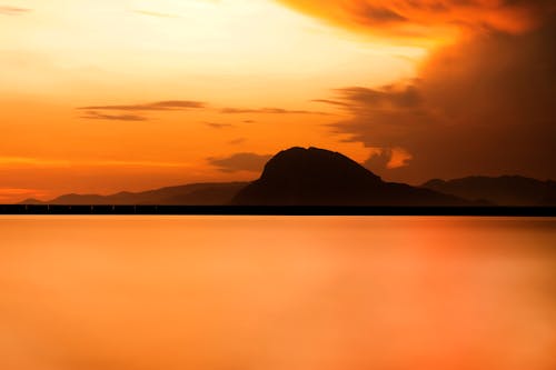 Silhouette of a Mountain Peak during Sunset