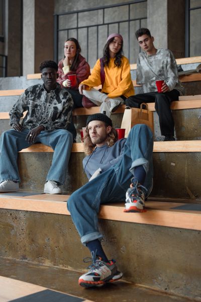 Group hanging out on concrete steps — Ron Lach on Pexels