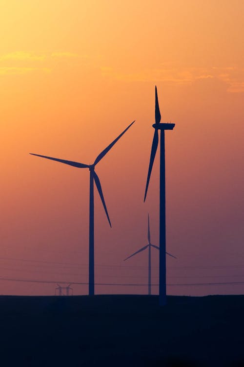 Silhouette of Windmills during Sunset