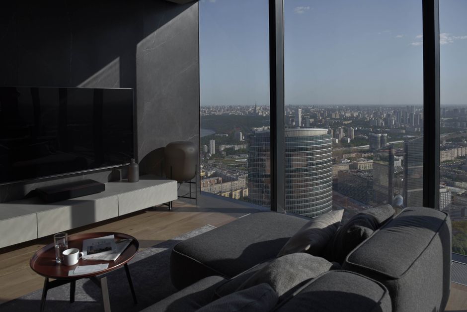 Luxury living room with panoramic city views - modern skyline view rentals Luxury living room with panoramic city views - modern skyline view rentals