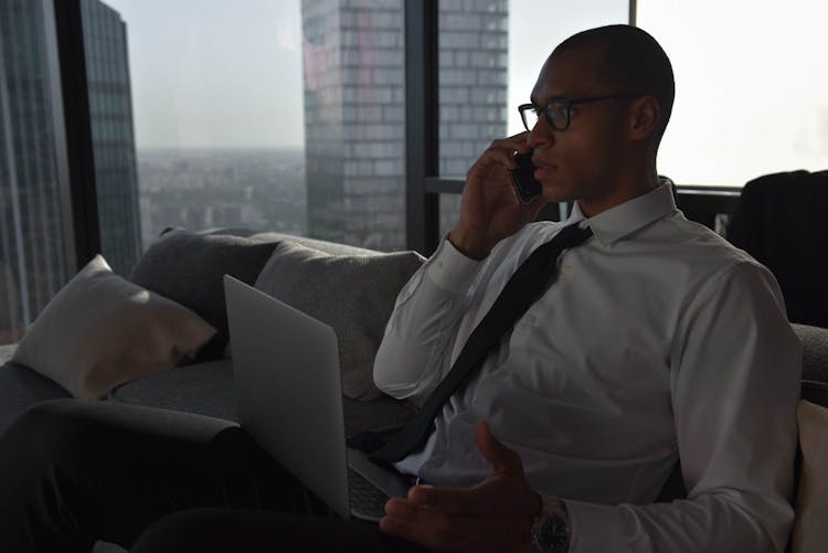 A Businessman Working While At Home