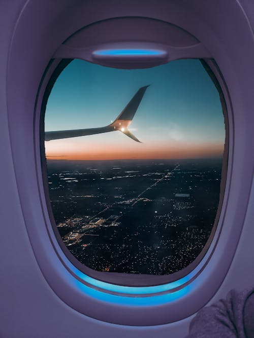 Kostnadsfri bild av flygplansfönster, flygvinge, närbild