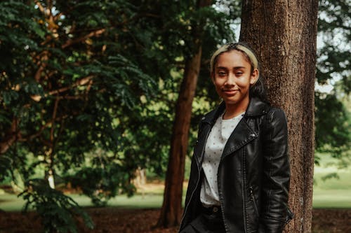 A Woman in Black Leather Jacket