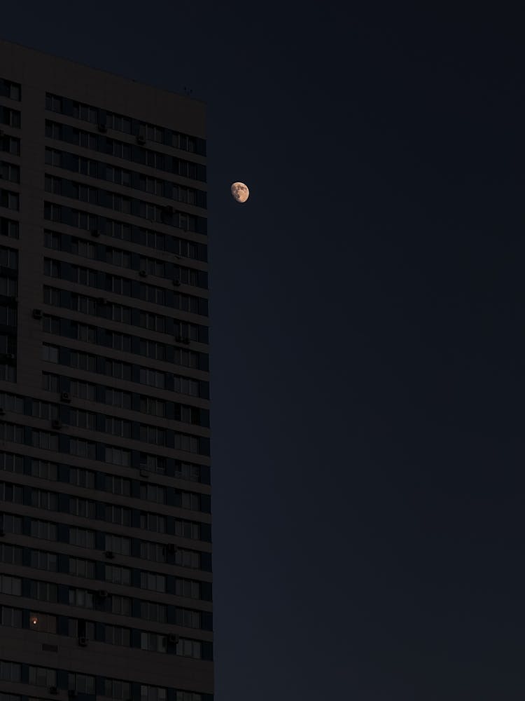 Moon Over High Rise Building