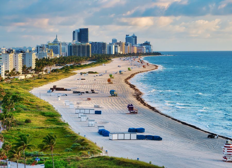 Aerial photo of Miami Beach with skyline and ocean, showcasing a vibrant summer cityscape.