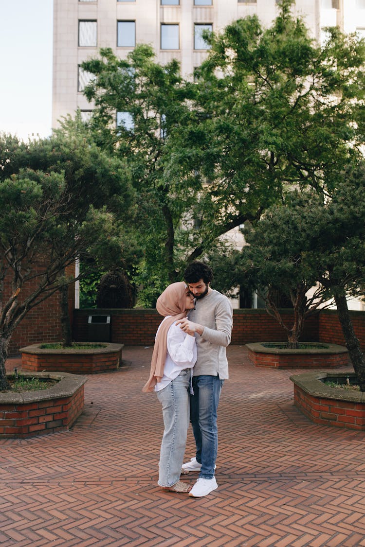 A Man And Woman Dancing Together