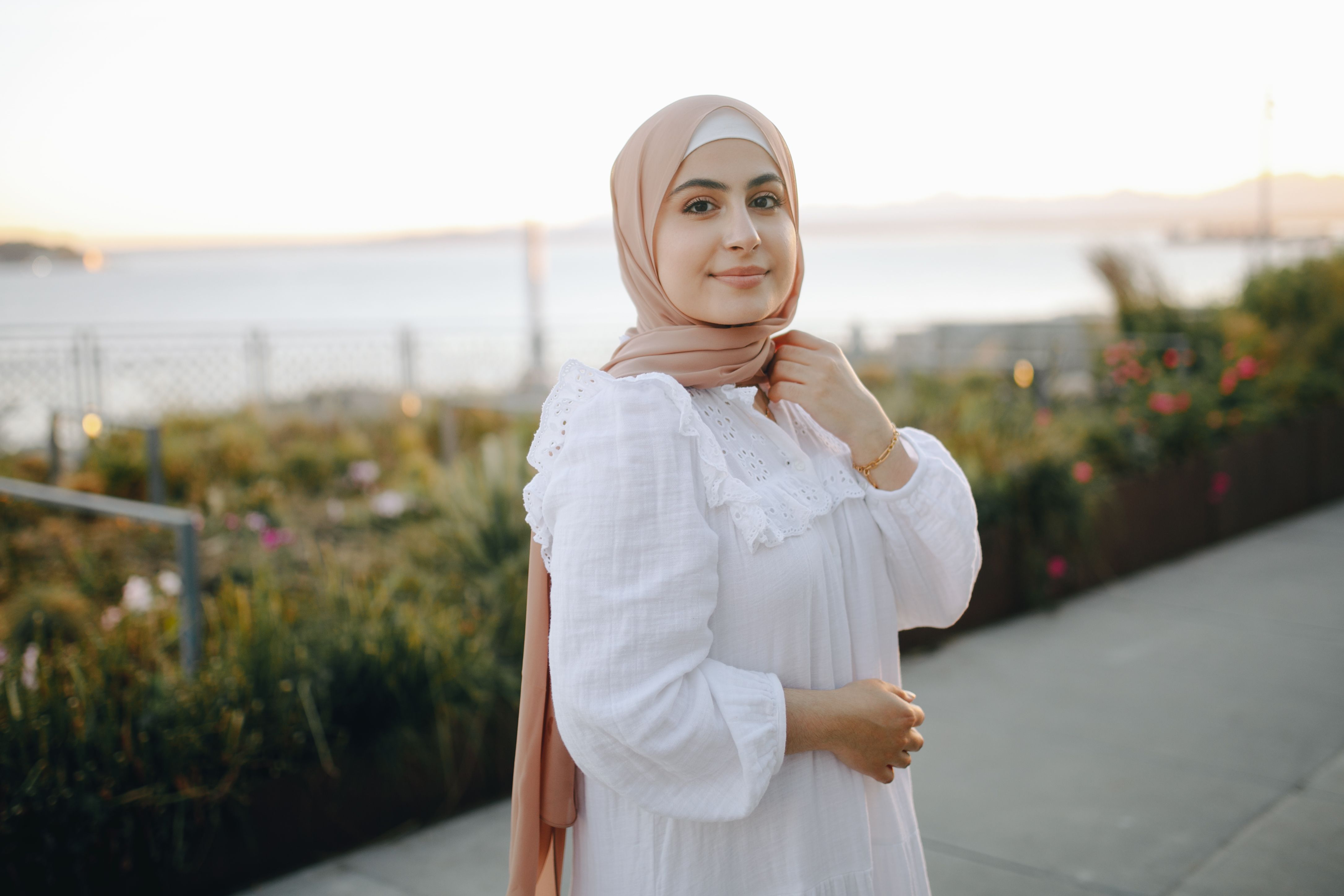 Woman in Beige Hijab and White Dress · Free Stock Photo
