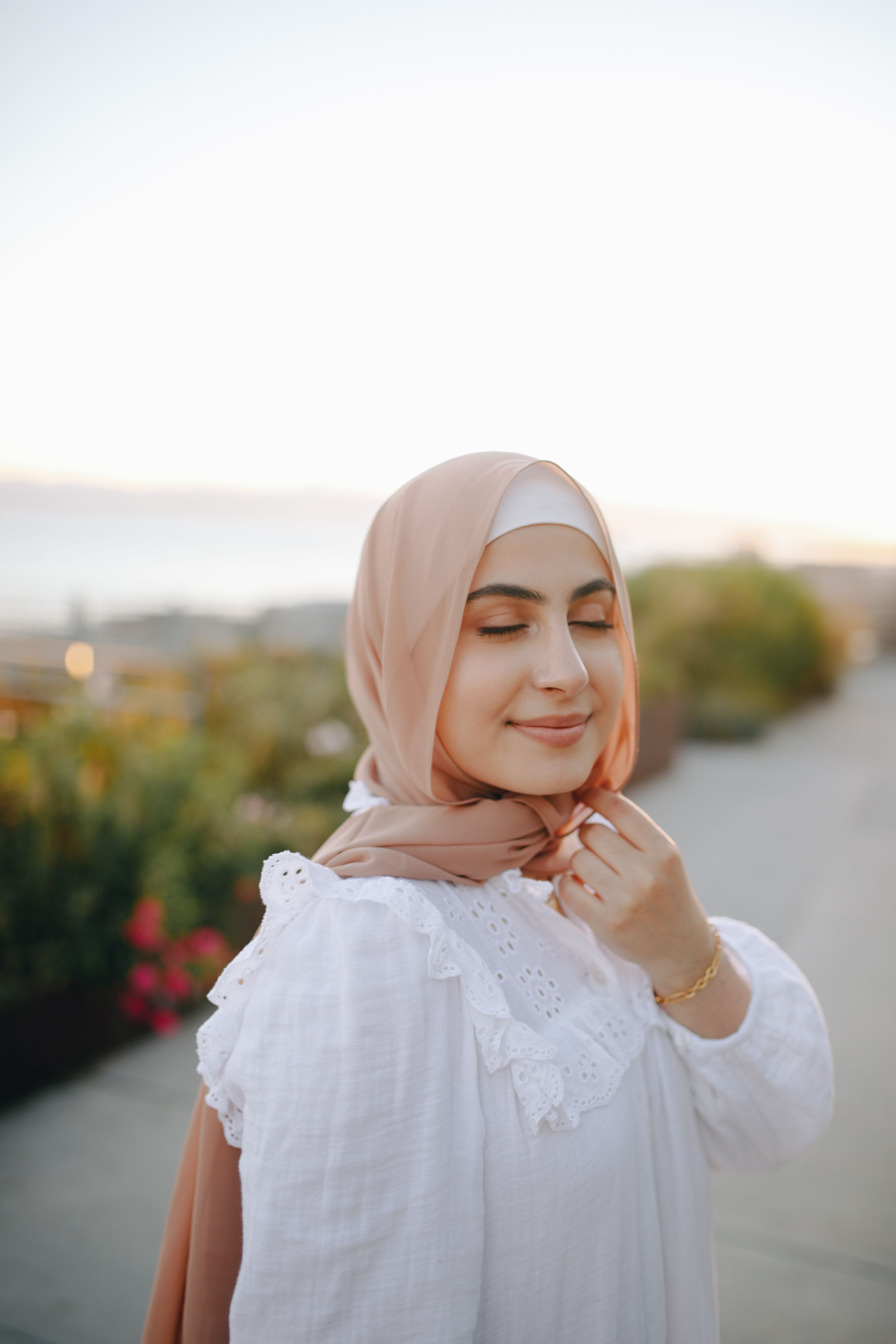 Portrait of a Beautiful Woman in Brown Hijab Smiling · Free Stock Photo