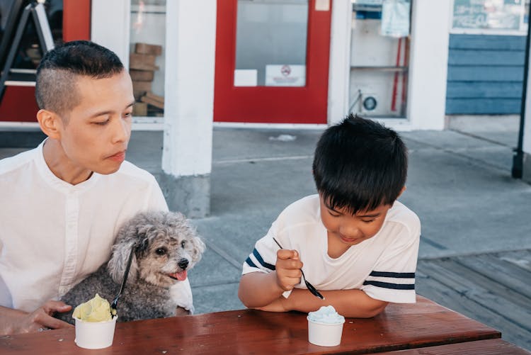 Dad And Son Eating Ice Cream