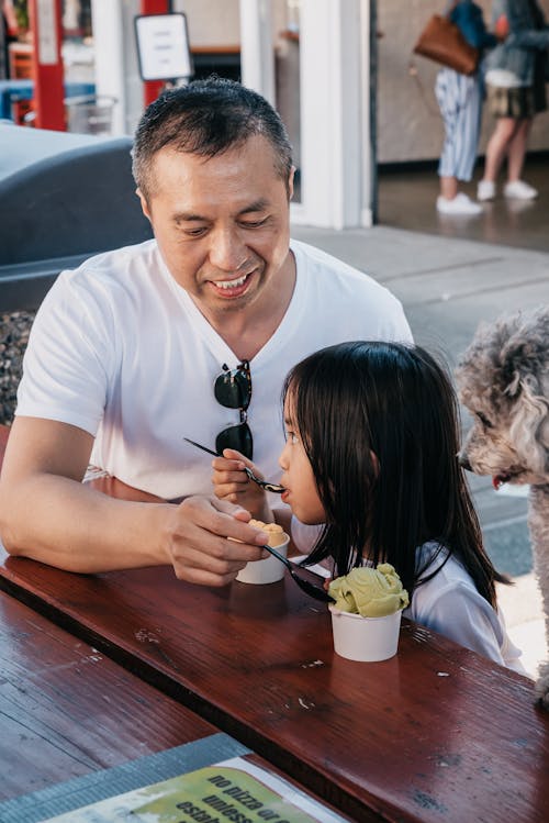 Dad and Daughter Eating Ice Cream