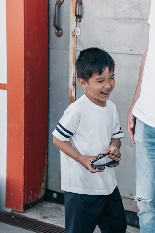 Free Smiling Boy in White Shirt Stock Photo