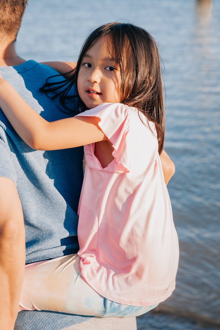 Young Girl On A Piggy Back Ride