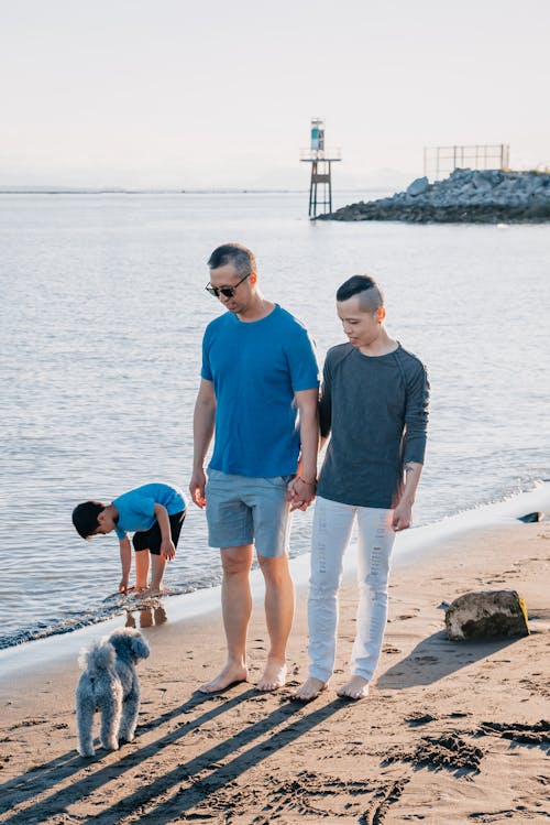 A Family Walking at the Beach
