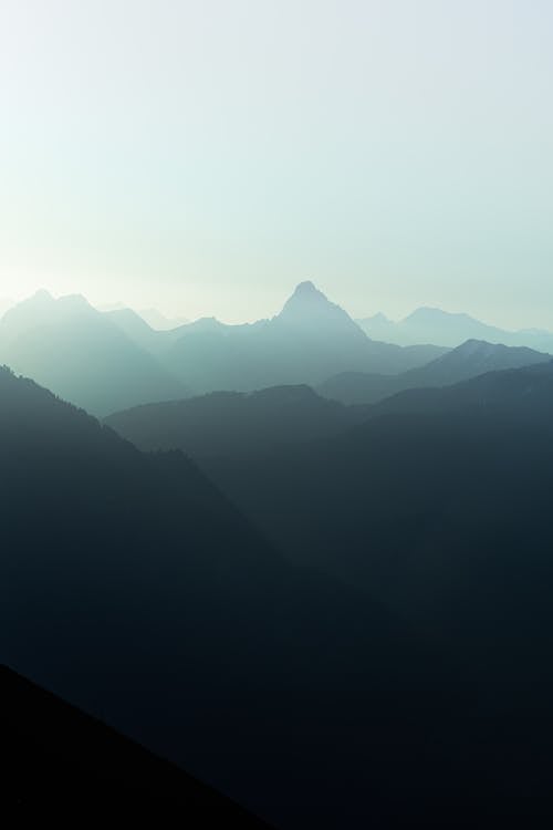 Free Mountain Ranges Under a Foggy Sky
 Stock Photo