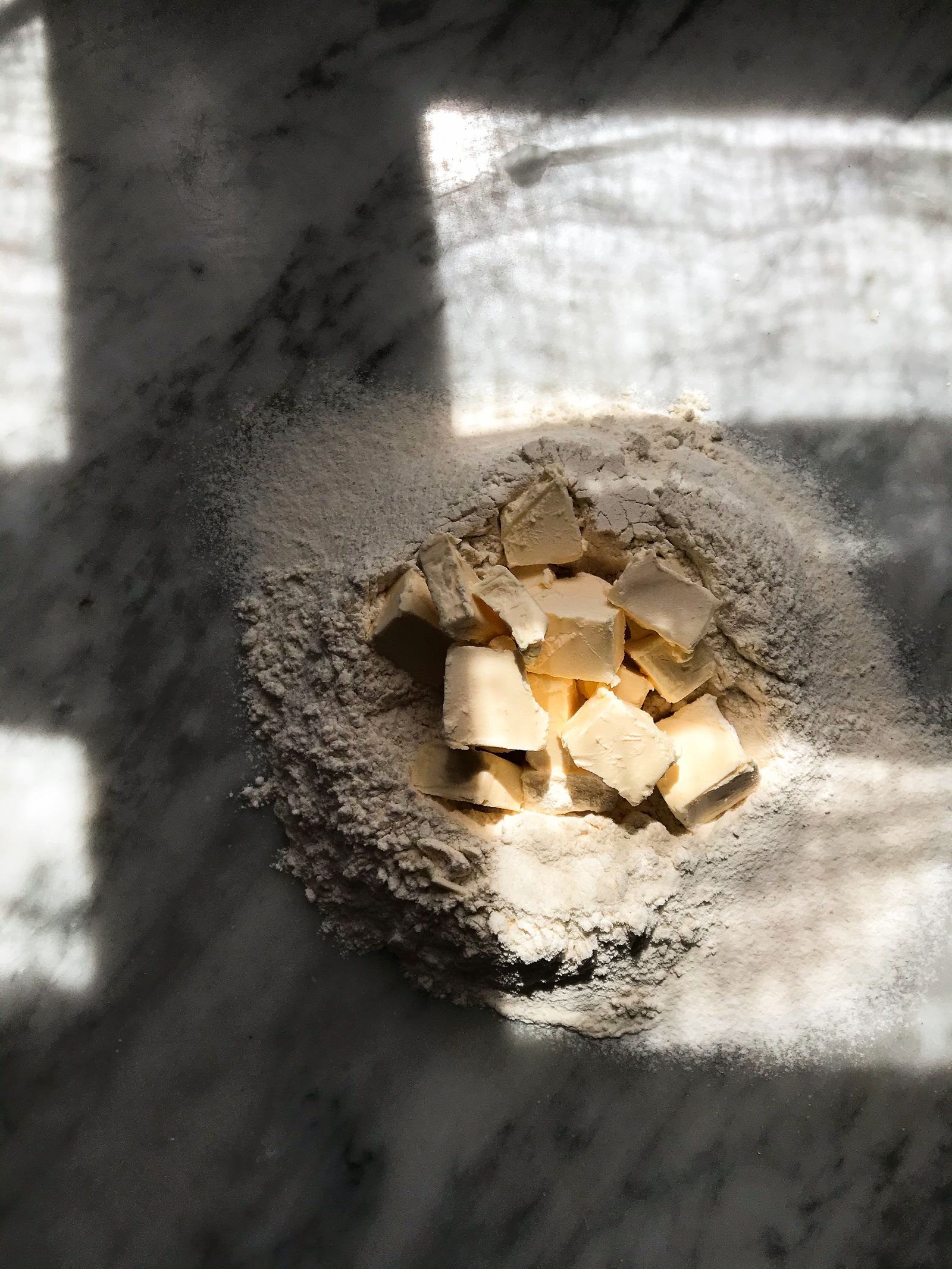 Baking ingredients on a marble kitchen counter