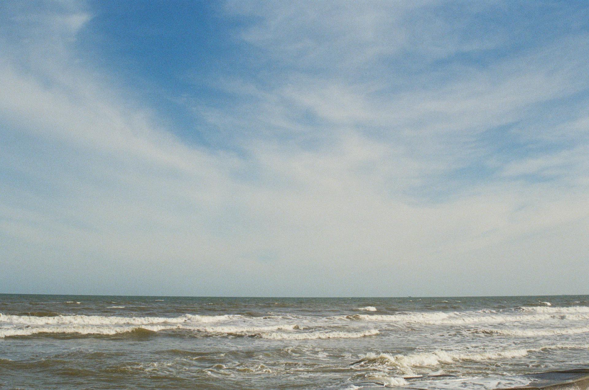 Tranquil seascape at Lang Phuoc Hai beach in Vietnam with beautiful sky and gentle waves.