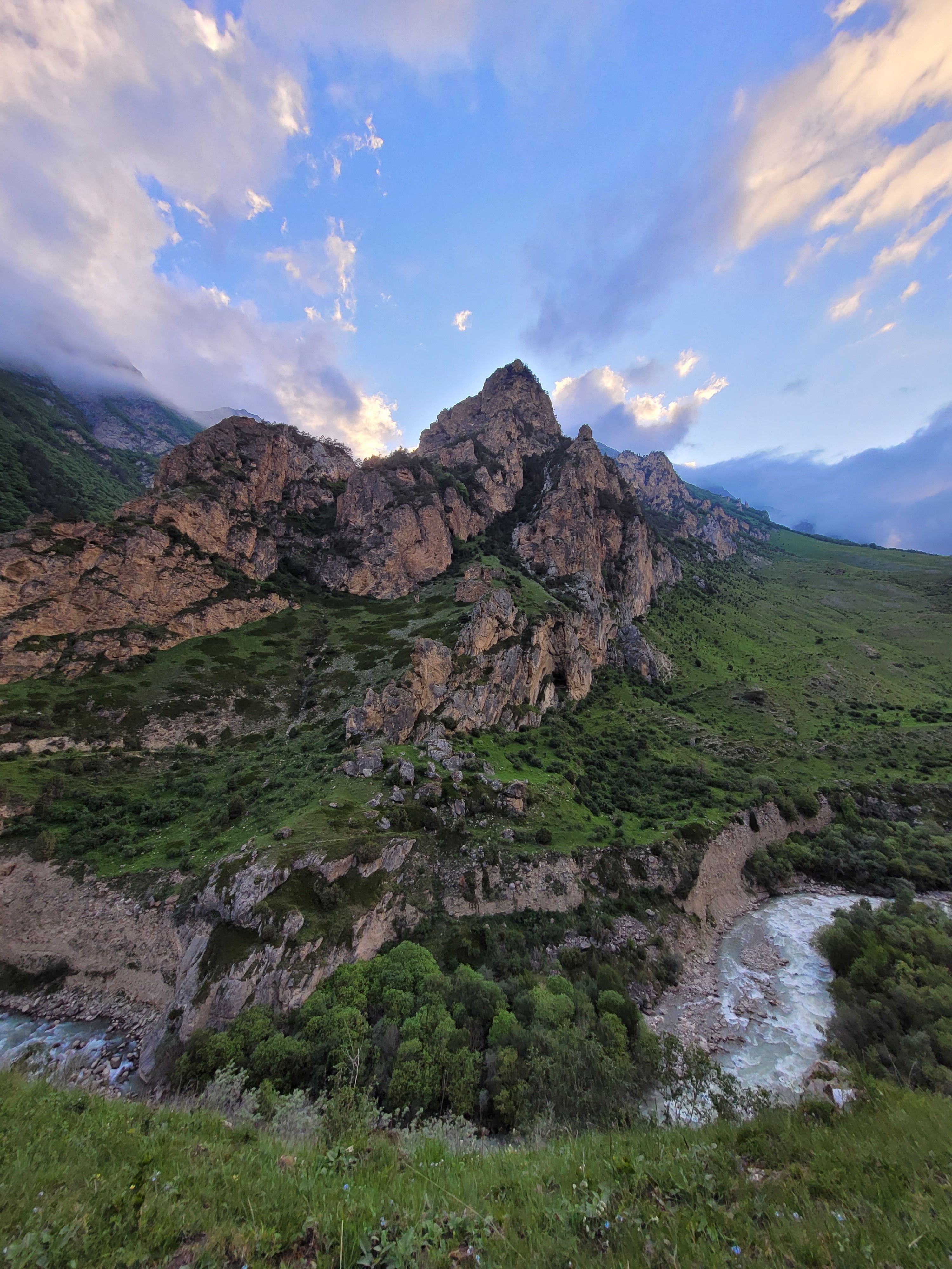 Landscape with Rocky Mountain and Clouds in Blue Sky · Free Stock Photo