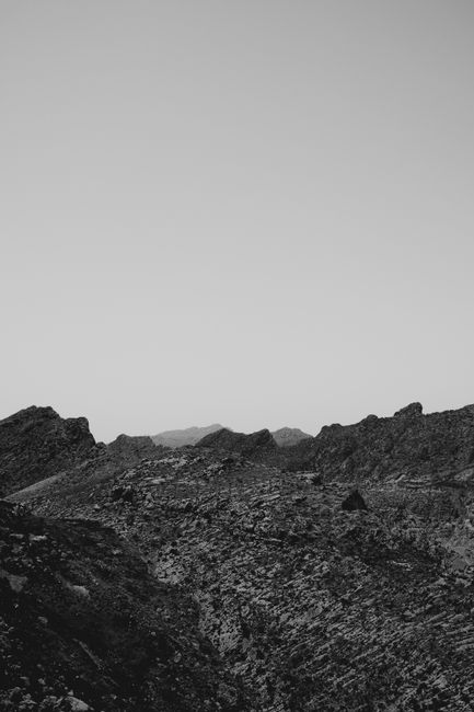 Black and white landscape featuring rugged rocky terrain in Palma, Spain.