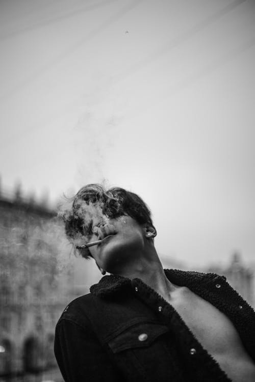 Free Grayscale Photo of a Man Smoking Stock Photo