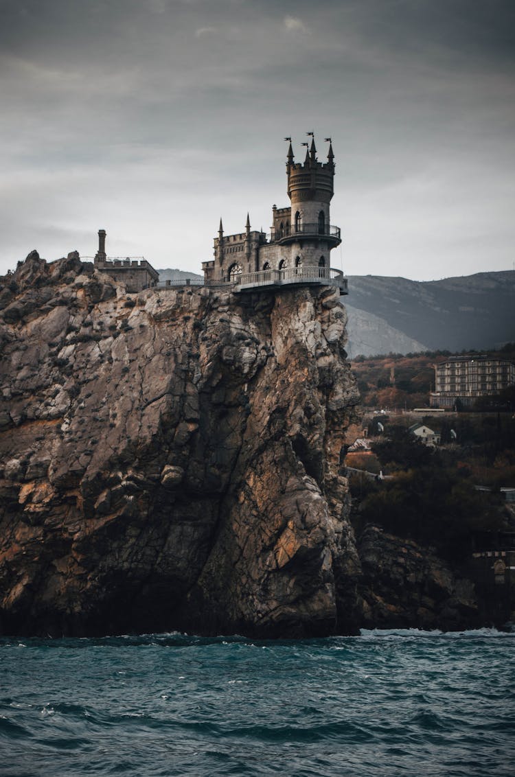 Castle On Top Of Cliff Overlooking Sea