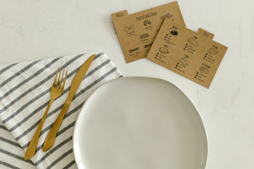 Free Gray Ceramic Plate on the Table Stock Photo