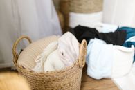 White Textile on Brown Woven Basket