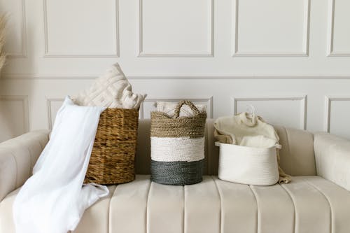 Free White and Brown Wicker Baskets on White Couch Stock Photo