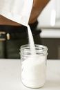 Clear Glass Jar With White Liquid
