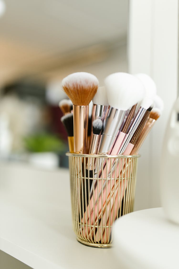 Makeup Brushes Organized In A Container