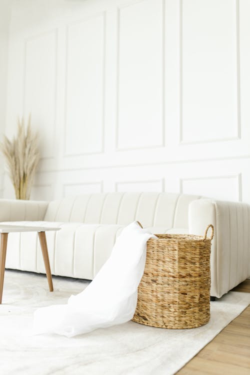 Wicker Basket beside White Sofa 