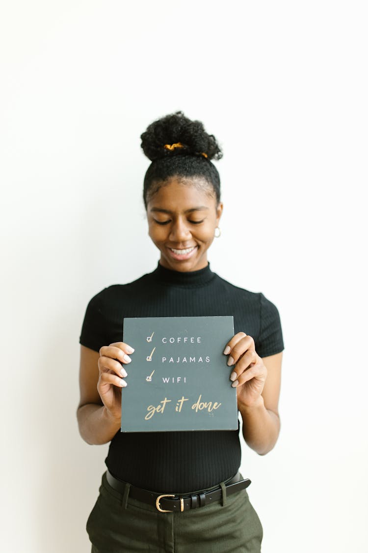 Woman Holding A To Do List Board 