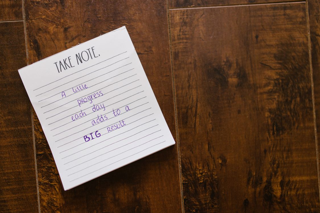 Handwritten Text on a Notebook · Free Stock Photo