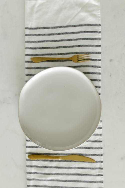 Free White Round Plate on White Table Stock Photo