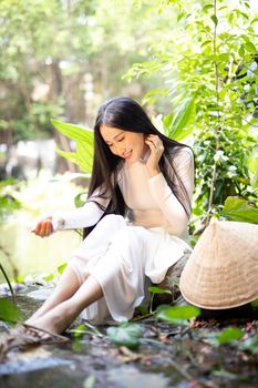 Beautiful Woman in White Dress in the Park 
