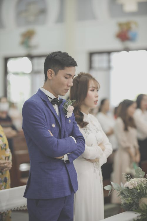 Young Couple Getting Married in a Church Celebration 