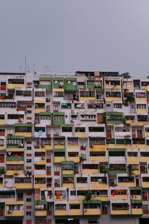 Green and Yellow Concrete Building · Free Stock Photo
