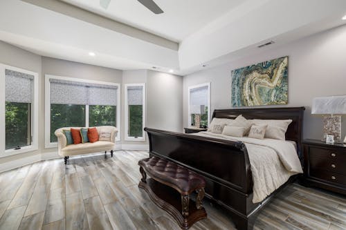 Brown Wooden Bed with White Blanket