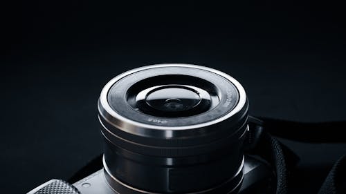 Free Black Camera Lens on a Black Background Stock Photo