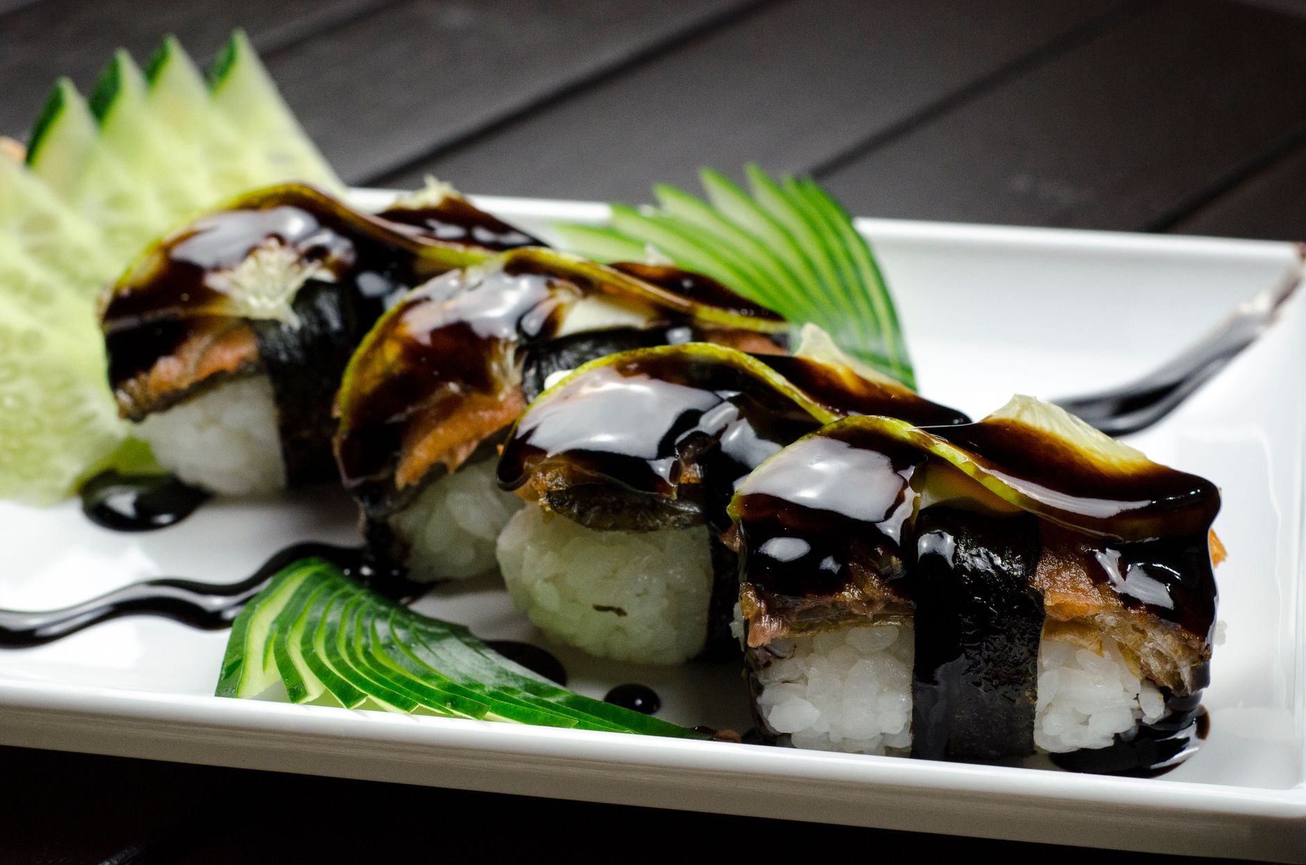 Bottle of Kikkoman gluten-free low sodium soy sauce next to fresh vegetables