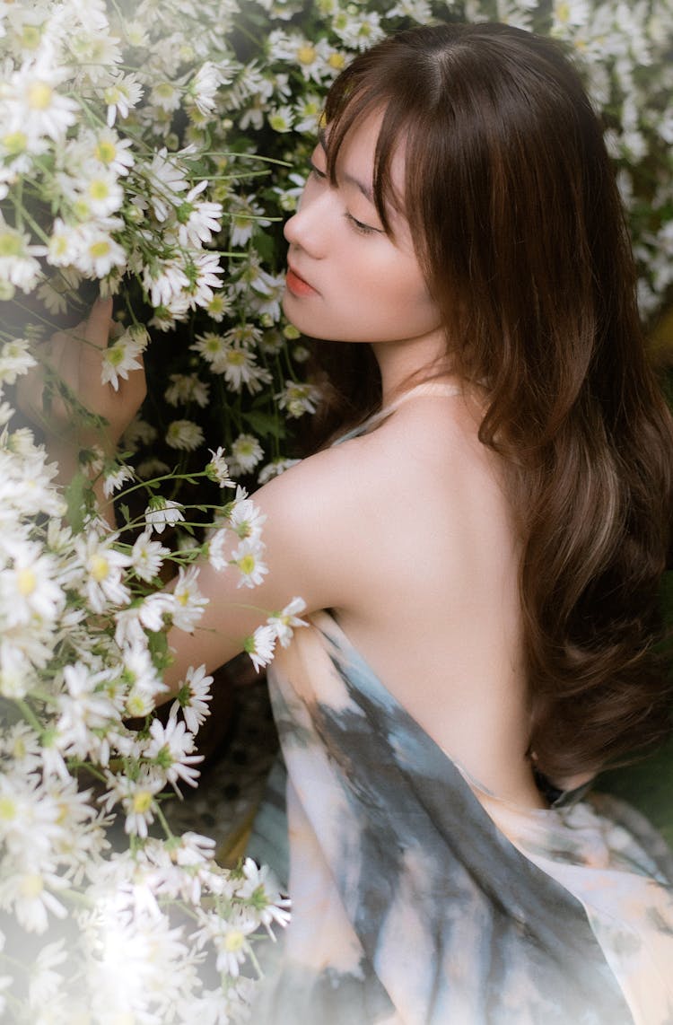 Woman In Backless Floral Dress