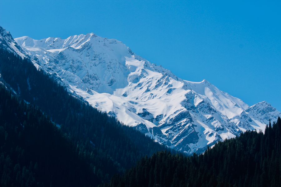 Stunning view of snow-covered peaks in the Himalayan range, Ghandruk, Nepal.