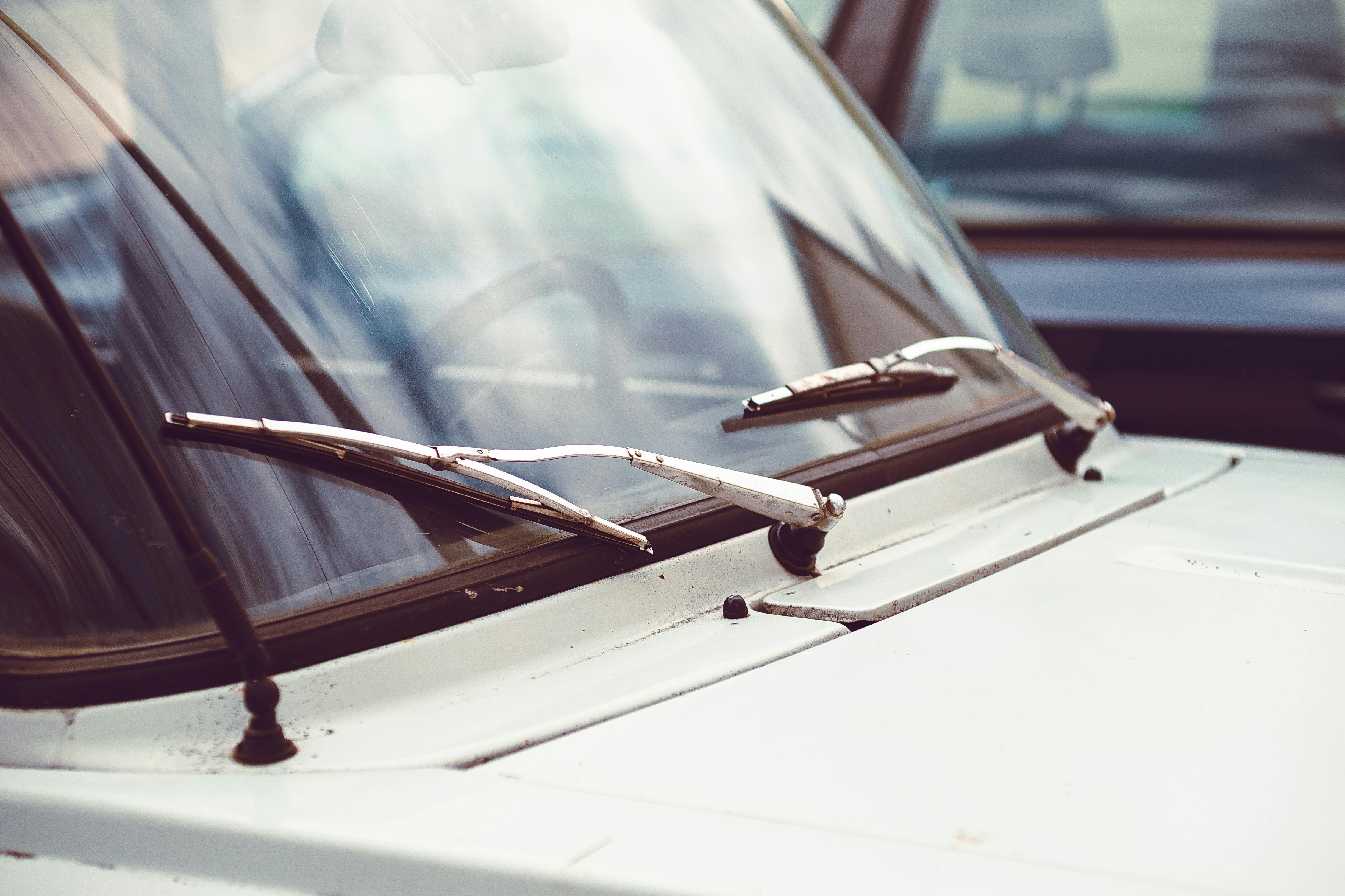 Wipers on the Windshield of White Car · Free Stock Photo