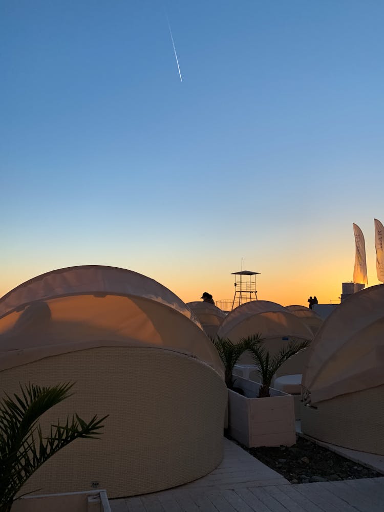 People Watching Falling Stars In A Camping Site