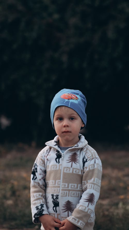 Cute Toddler Standing Near the Woods